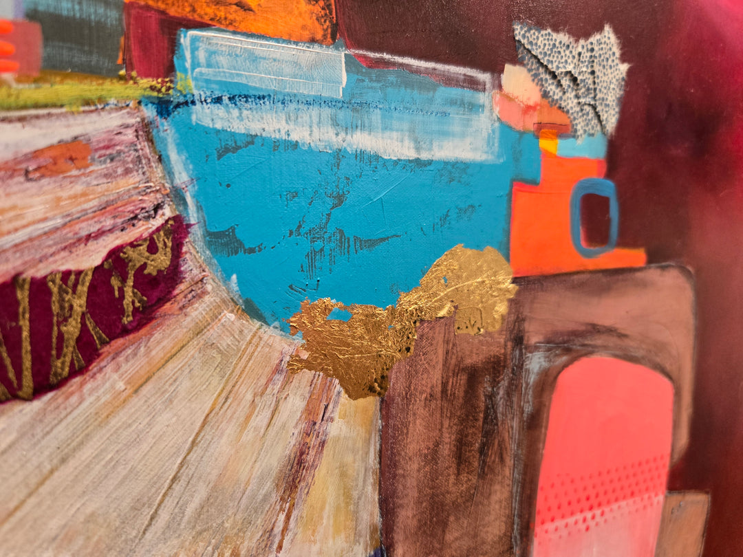 48" x 48" painting by Lau Blou, collaged pieces of torn and hand cut paper and fabrics with patterns and gold foil building up to triangular shape in middle of canvas on pink background with white on the bottom half