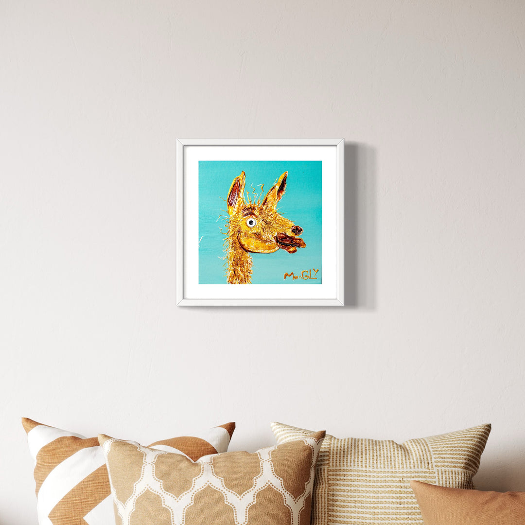 Acrylic 12" x 12" matted Free artwork by Moogly. Turquoise background with an animated gold llama poking his head up.