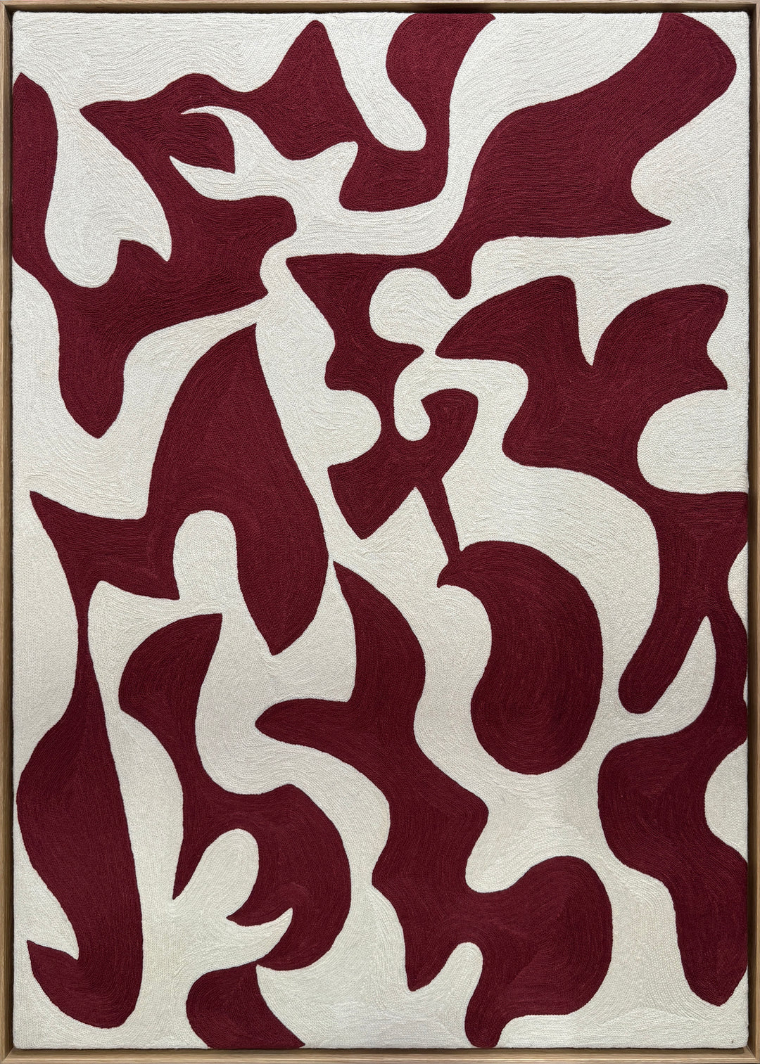 abstract shapes in rust orange red color on cream white background embroidery textile chain stitched design negative space shapes and patterns 