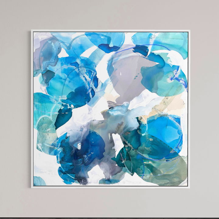 Liz Barber, Dancing Wave 3, acrylic paint, ink, watercolor, graphite, and pastel on canvas, 60 x 60 inches. Square abstract composition of overlapping translucent shapes in cobalt, cerulean, turquoise, teal, lavender gray, and pale beige with white linear marks, shown in a thin white frame on a light gray wall.