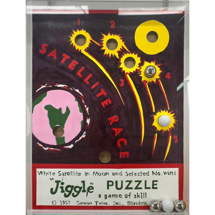 mixed media puzzle collage in plexiglass satellite race kid game nostalgia vintage retro ball jiggle puzzle graphic 