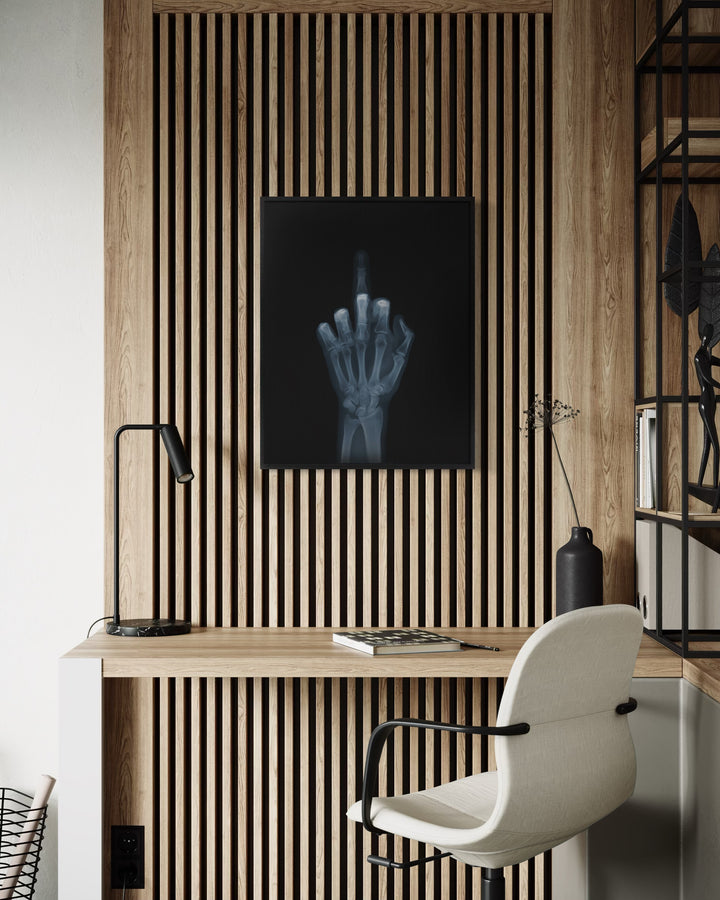 Framed Lenticular black and white x-ray photograph by Nick Veasey of a skeletal hand flipping the bird to the camera, middle finger is moving up and down 