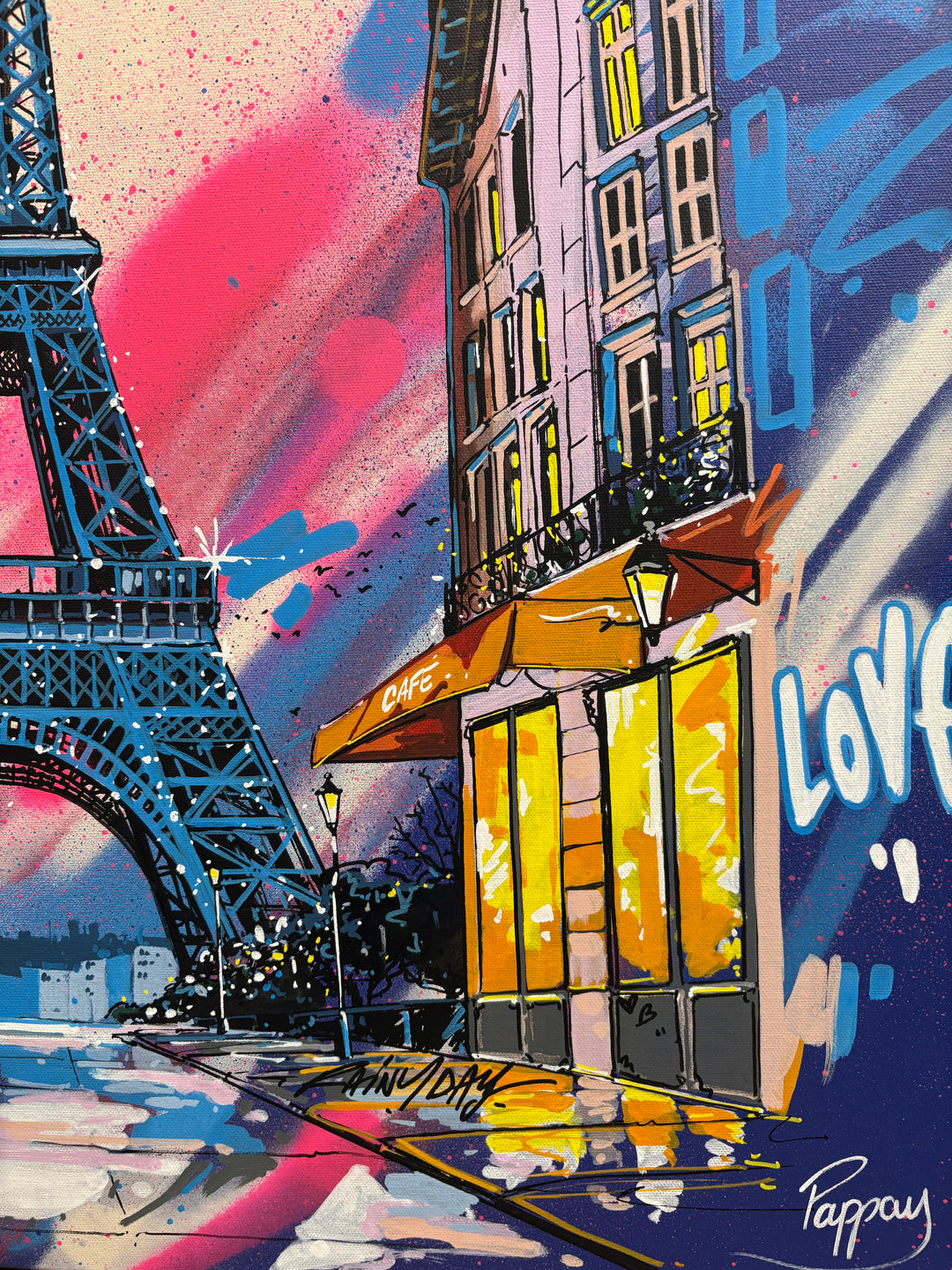 "From Paris with Love" by Pappay — a vibrant street art-inspired painting on canvas depicting the Eiffel Tower framed by a Parisian boulevard with glowing cafés and street lamps, surrounded by explosive blue, pink, and white graffiti lettering reading "Paris" and "Love" against a deep cobalt sky. A bold, romantic celebration of Paris. Original contemporary Paris Eiffel Tower street art pop art painting on canvas available at Morton Contemporary gallery.