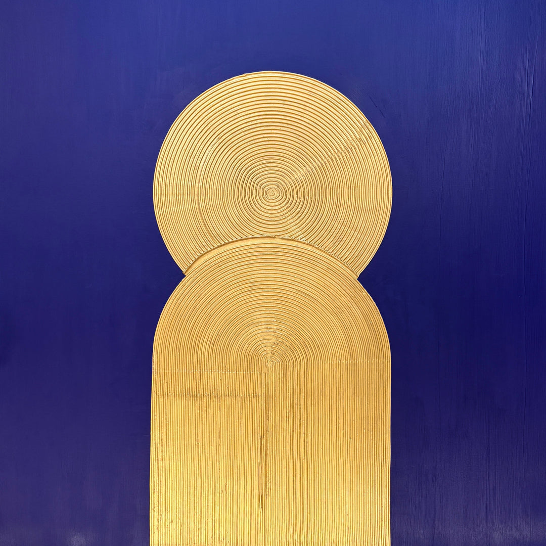 Lee in Cerulean, Halo Vaste I, joint compound and acrylic paint on canvas, 48 x 48 inches. Square textured painting with a deep blue background and a gold circle of concentric raised ridges overlapping the top of a gold arch that rises from the bottom edge.