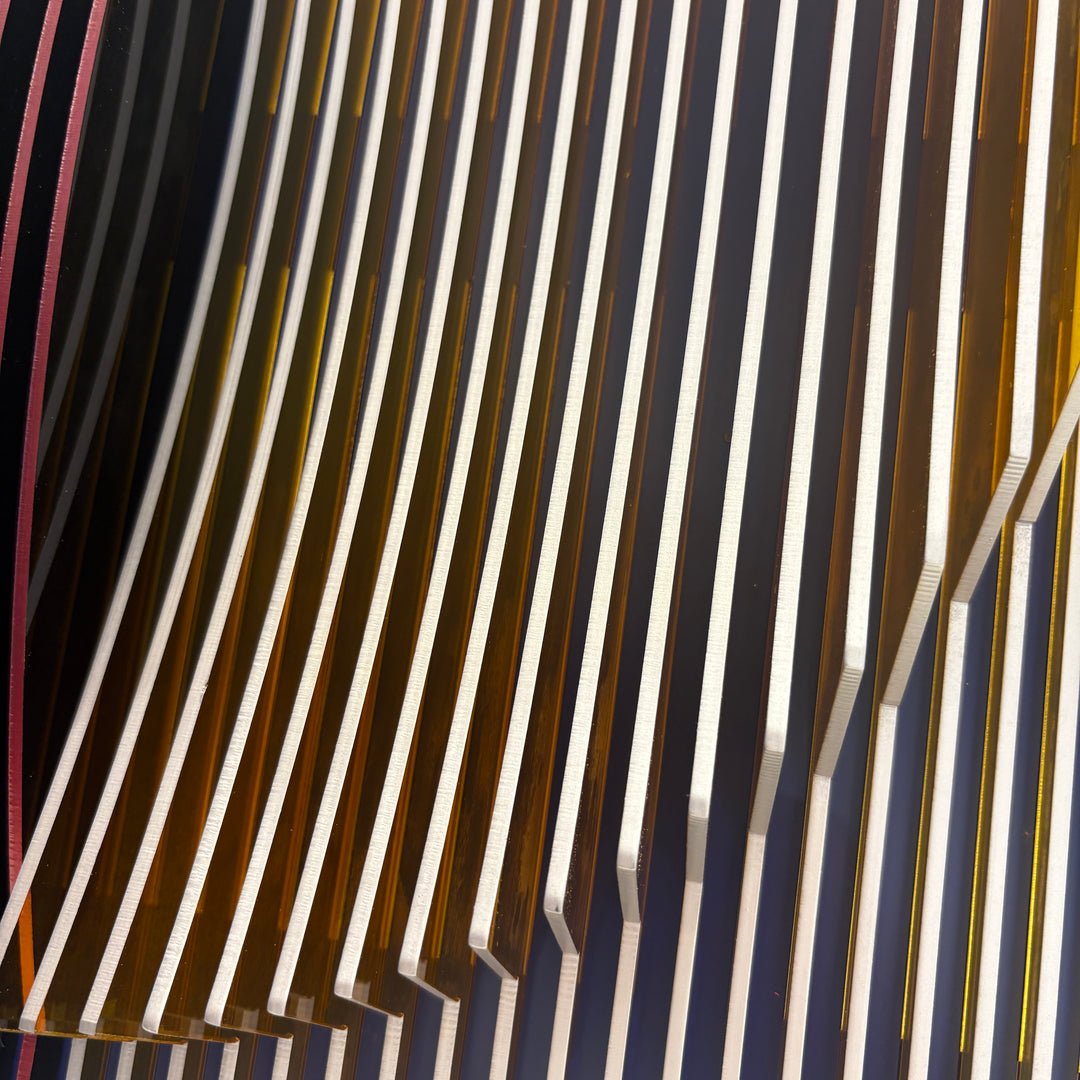 vertical stripes in purple white and navy with half convex concave sculptural circle shape coming out of center geometric abstract