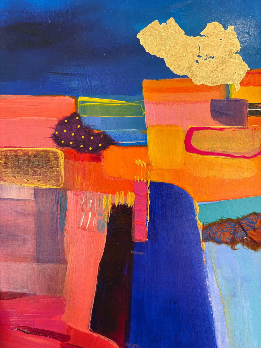 abstract geometric collage landscape with pink orange and green paint fabric graphite gold leaf on cloudy washy blue background