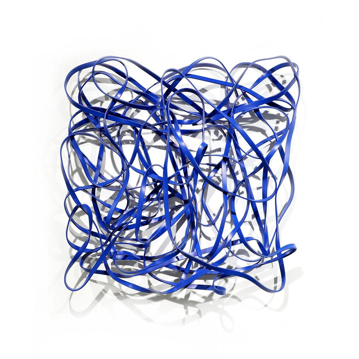 Matt Devine, 1984, powder-coated aluminum, made to order from 11 to 84 inches. Square wall sculpture of thin blue aluminum ribbons bent into tangled, overlapping loops on a white wall.