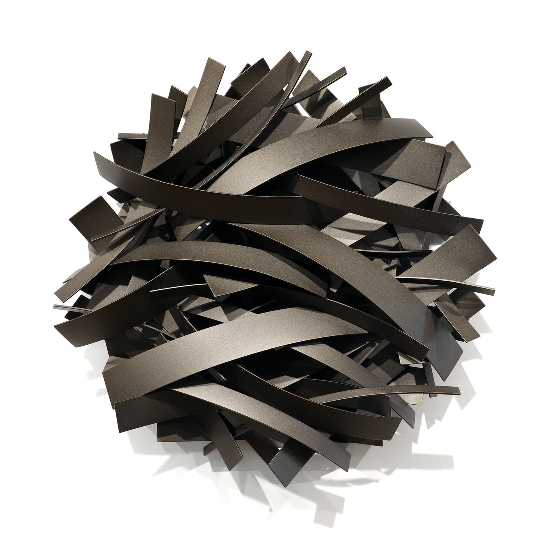 Matt Devine, Mixed Bands, powder-coated aluminum, made to order from 11 to 84 inches. Round wall sculpture of curved dark bronze and gunmetal aluminum bands in mixed widths, layered in overlapping horizontal arcs on a white wall.