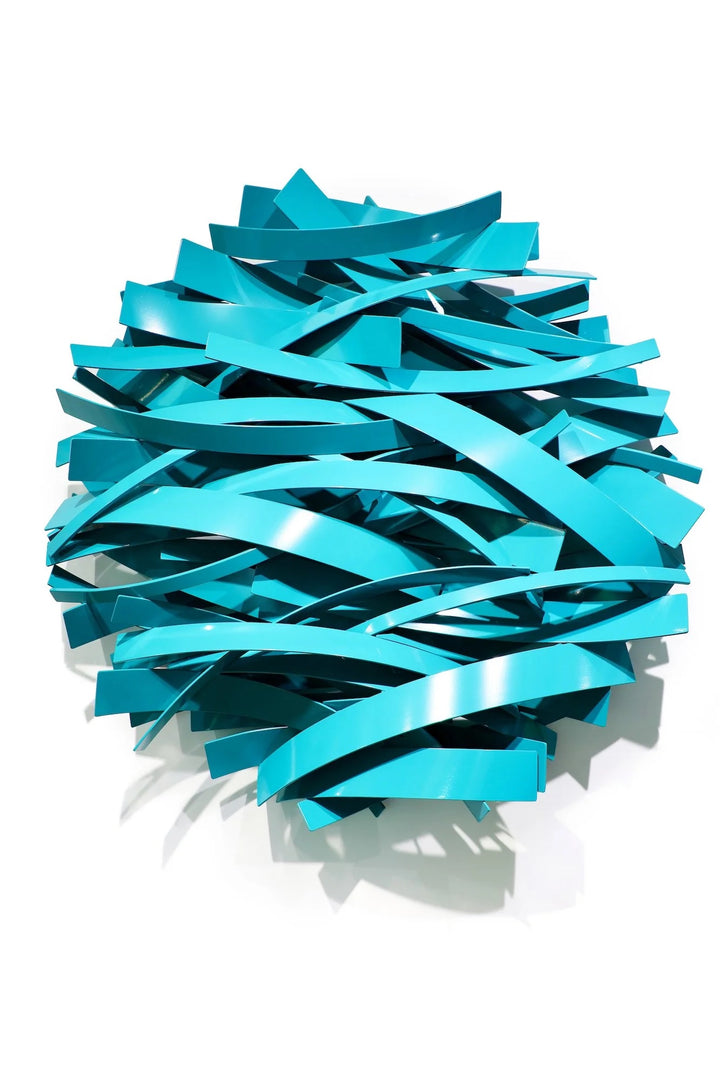 Matt Devine, Mixed Bands, powder-coated aluminum, made to order from 11 to 84 inches. Round wall sculpture of curved glossy turquoise aluminum bands in mixed widths, layered in overlapping horizontal arcs on a white wall.