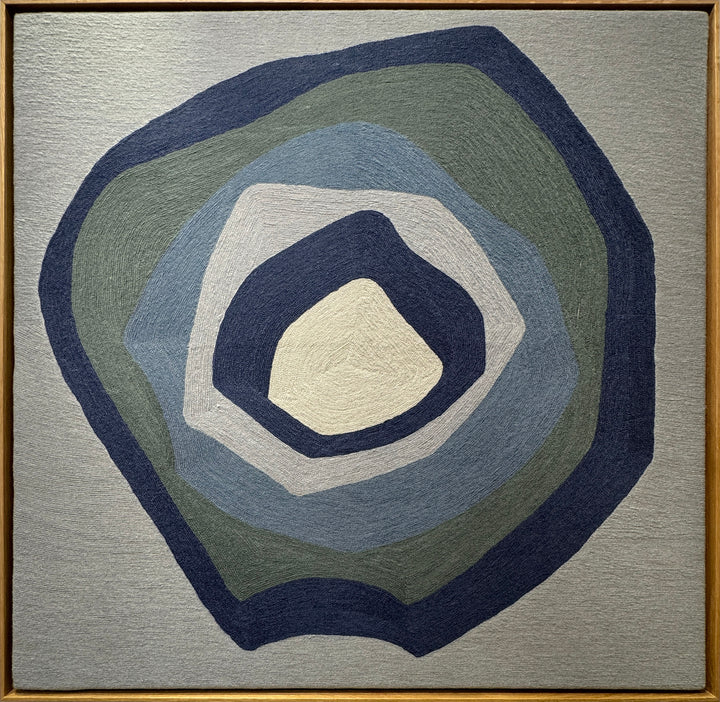 43"x42.5" chain-stitched textile with blue hues in a geometric form. 