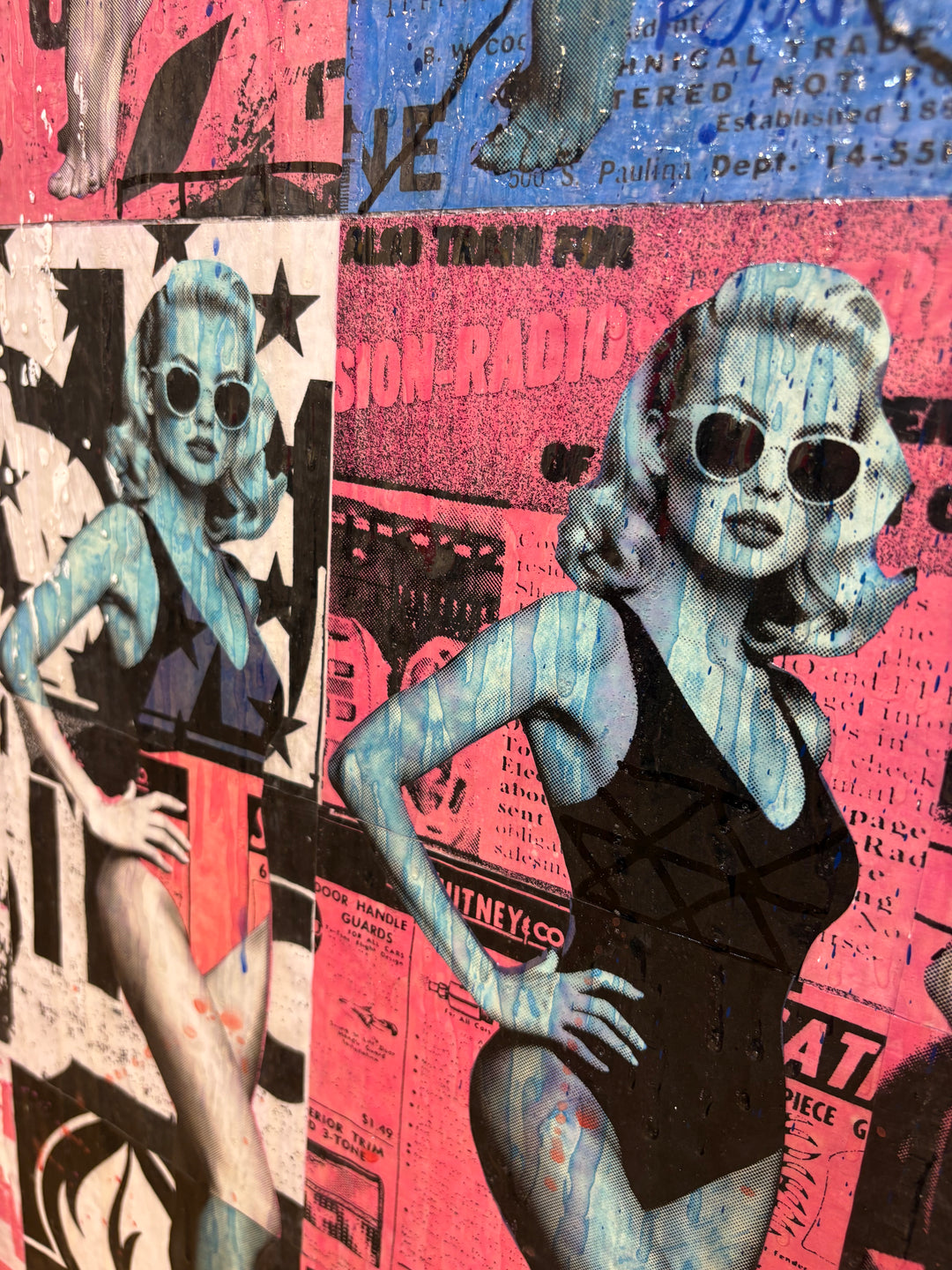 Picture Perfect by Jon Davenport — angled detail of Neo-Pop mixed media painting featuring retro pin-up figures in sunglasses and swimwear over vintage newspaper collage