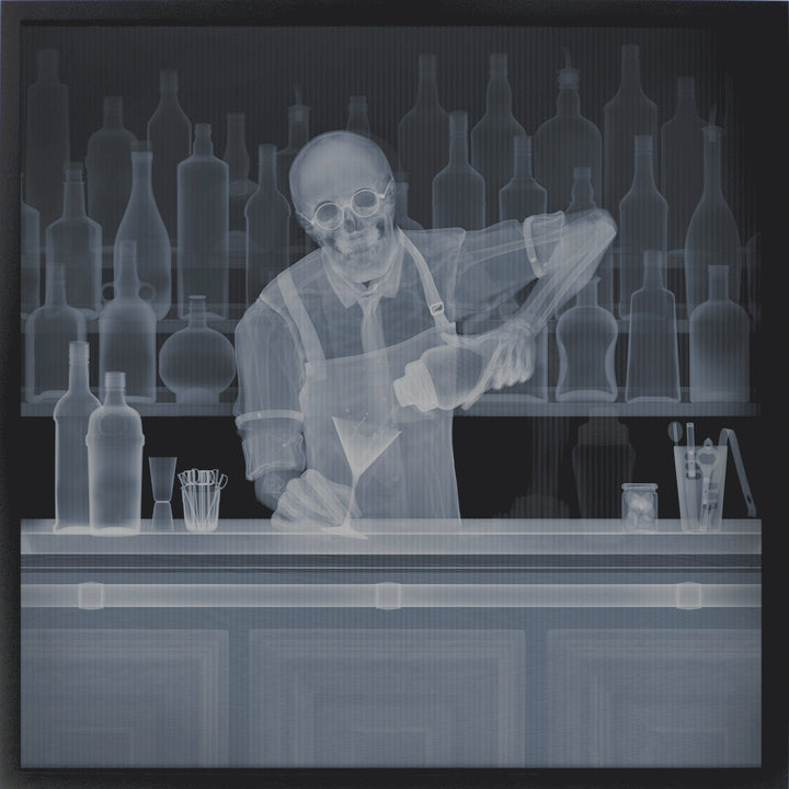 bartender skeleton xray puring and shaking drink cocktail in front of bar with glasses and bottles