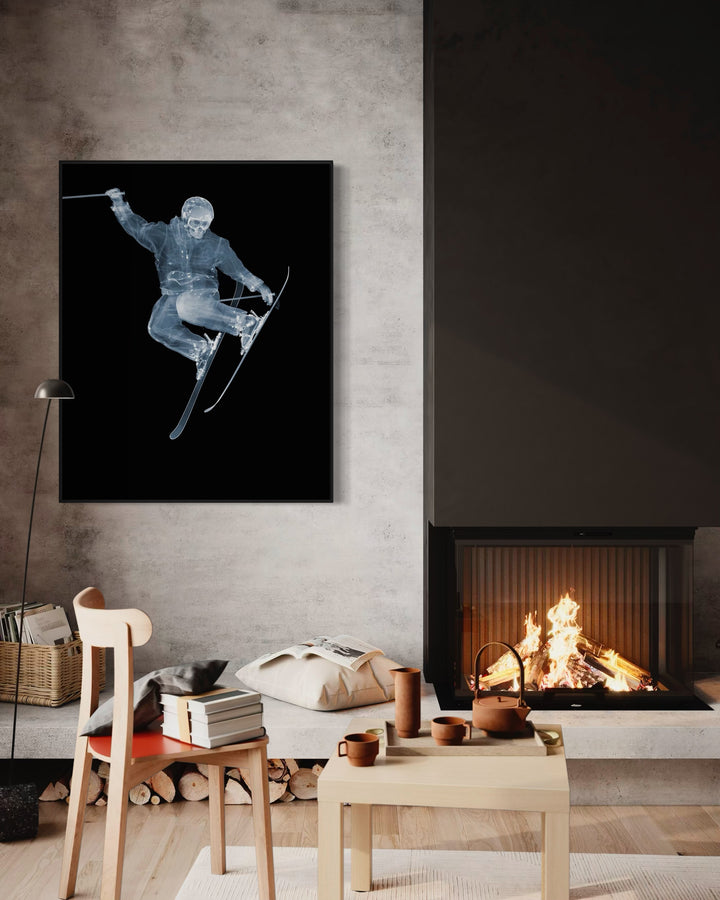 Framed Chromaluxe x-ray photograph by Nick Veasey of a skeleton skier jumping on a black background