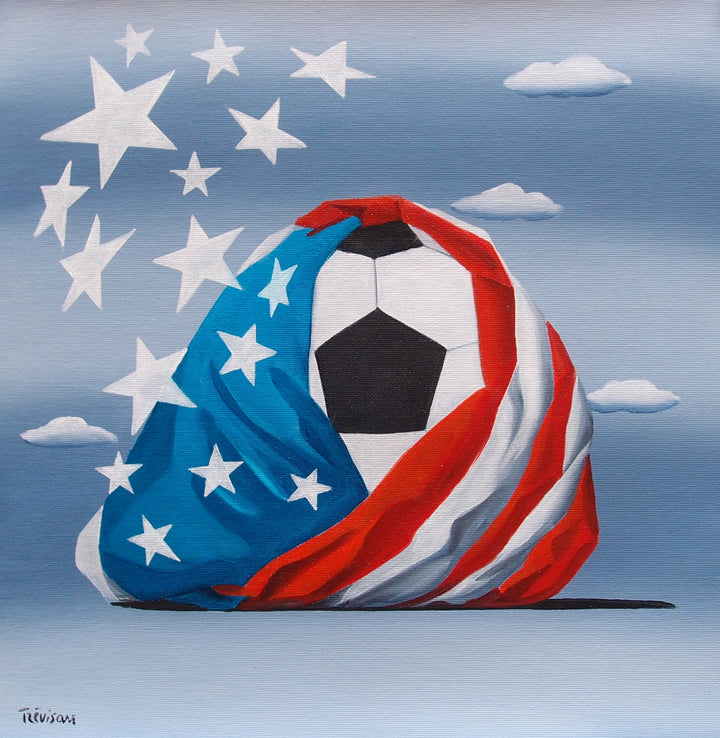 "Soccer in USA" by Italian artist Carlo Trevisan — a surrealist oil painting on canvas depicting a classic black and white soccer ball dramatically wrapped in a billowing American flag, with oversized white stars bursting free against a cloudy blue sky. The bold, celebratory composition unites the world&