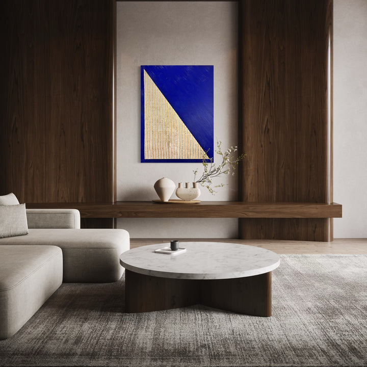 minimal geometric abstract sculptural work with joint compound texture dimension white rigid triangle with gold leaf detail on blue background
