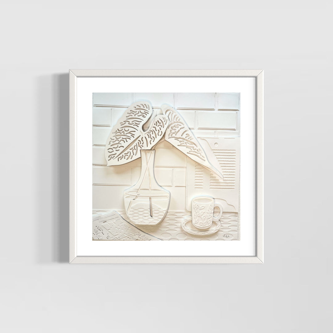 14"x14" layered white paper forming a a vase with leaves on a wall. 