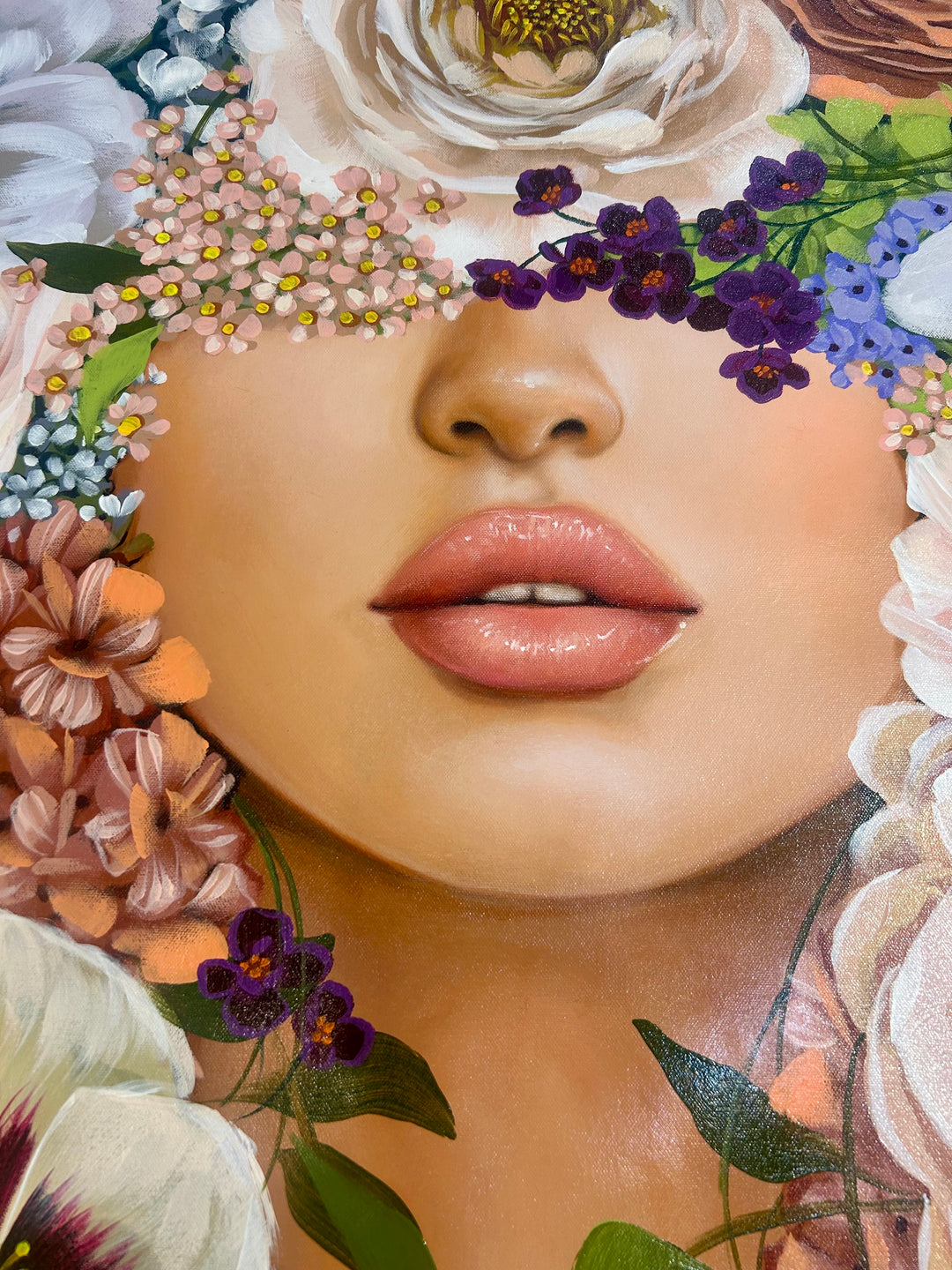 37"W x 50"H Acrylic portrait on canvas. Woman with the upper half of her face covered by colorful flowers that extend to the foreground. 
