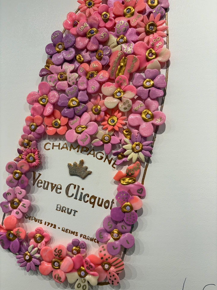 Acrylic clay and modeling paste painting of bottle champagne of pink 3 dimensional flowers coming out of bottle to butterflies on white canvas