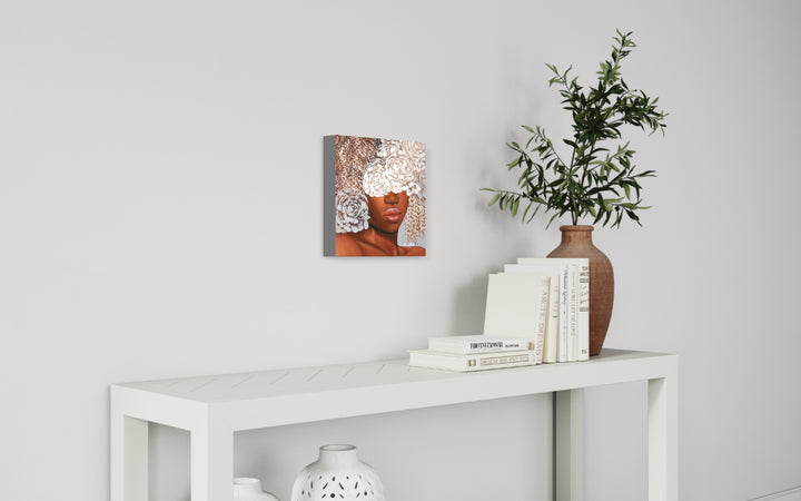 Silver, artwork by Sally K., displayed in a home. Acrylic paint and silver leaf on canvas. 12 by 12 inches.